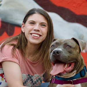 Brianna Lovell-Meyers with large brown dog